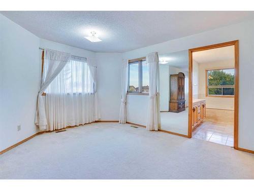 106 Sienna Hills Drive Sw, Calgary, AB - Indoor Photo Showing Other Room