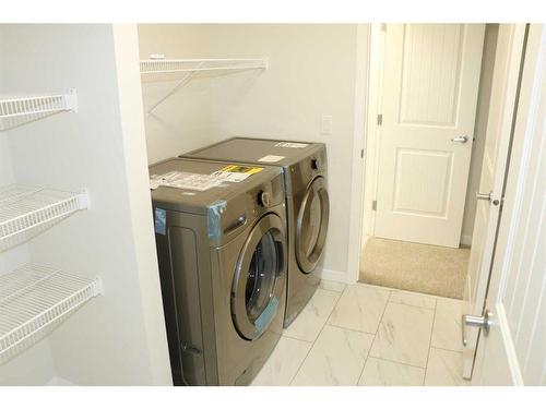 172 Hotchkiss Way Se, Calgary, AB - Indoor Photo Showing Laundry Room