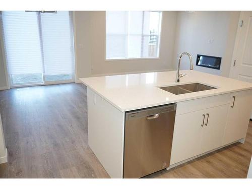 172 Hotchkiss Way Se, Calgary, AB - Indoor Photo Showing Kitchen With Double Sink