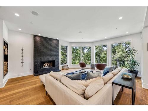 1130 23 Avenue Nw, Calgary, AB - Indoor Photo Showing Living Room With Fireplace