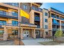 115-125 Wolf Hollow Crescent Se, Calgary, AB  - Outdoor With Facade 