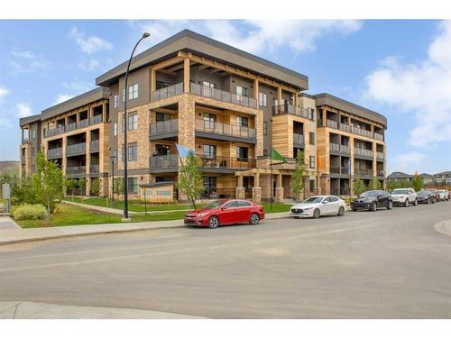 115-125 Wolf Hollow Crescent Se, Calgary, AB - Outdoor With Facade