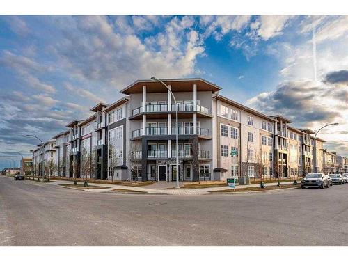 2301-681 Savanna Boulevard Ne, Calgary, AB - Outdoor With Balcony With Facade