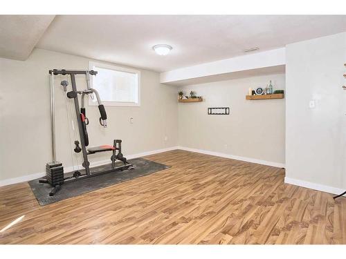 9221 Saddlebrook Drive Ne, Calgary, AB - Indoor Photo Showing Gym Room