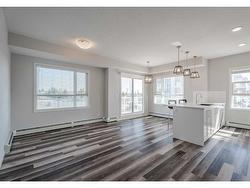 302-300 Harvest Hills Place NE Calgary, AB T3K 2P4