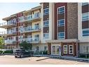 302-300 Harvest Hills Place Ne, Calgary, AB  - Outdoor With Balcony With Facade 