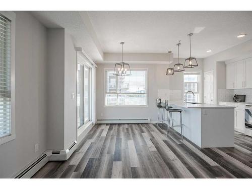 302-300 Harvest Hills Place Ne, Calgary, AB - Indoor Photo Showing Kitchen