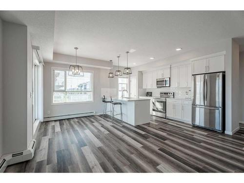 302-300 Harvest Hills Place Ne, Calgary, AB - Indoor Photo Showing Kitchen With Upgraded Kitchen