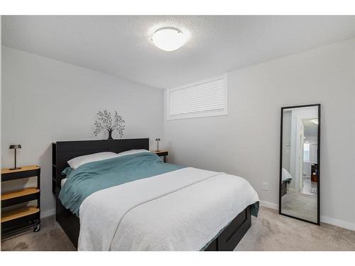 124 Cranbrook Square Se, Calgary, AB - Indoor Photo Showing Bedroom