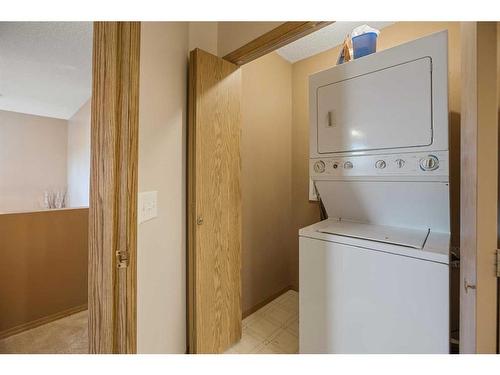 151 Somercrest Gardens Sw, Calgary, AB - Indoor Photo Showing Laundry Room