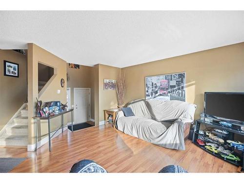 151 Somercrest Gardens Sw, Calgary, AB - Indoor Photo Showing Bedroom