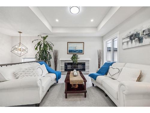 132 Walcrest View Se, Calgary, AB - Indoor Photo Showing Living Room With Fireplace