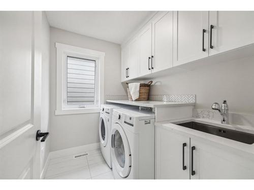 132 Walcrest View Se, Calgary, AB - Indoor Photo Showing Laundry Room