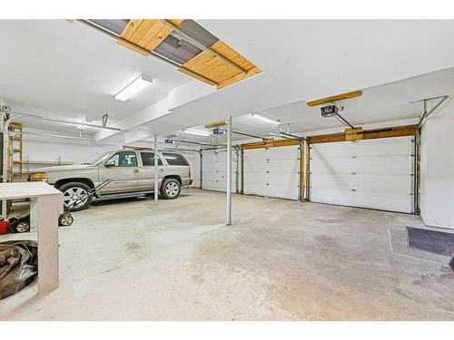 123 Coach Light Bay Sw, Calgary, AB - Indoor Photo Showing Garage