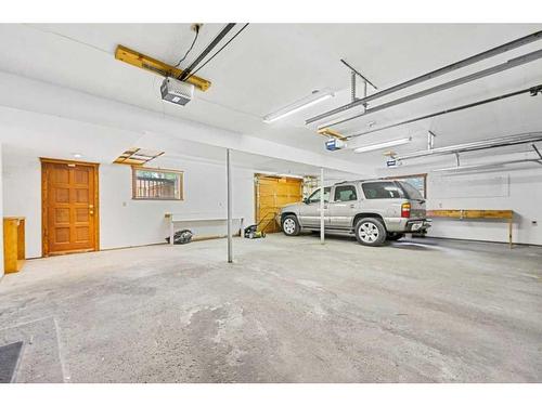 123 Coach Light Bay Sw, Calgary, AB - Indoor Photo Showing Garage