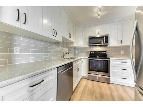 33-11333 30 Street Sw, Calgary, AB - Indoor Photo Showing Kitchen With Stainless Steel Kitchen With Upgraded Kitchen