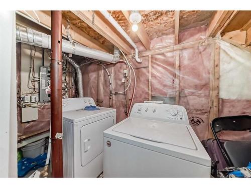 434 Saddlecreek Way Ne, Calgary, AB - Indoor Photo Showing Laundry Room