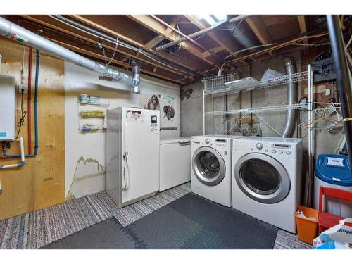 7035 Huntercrest Road Nw, Calgary, AB - Indoor Photo Showing Laundry Room