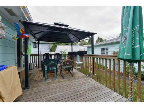 7035 Huntercrest Road Nw, Calgary, AB - Outdoor With Deck Patio Veranda With Exterior