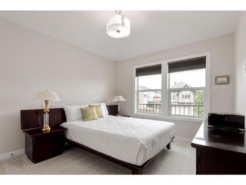 216 Cranarch Crescent Se, Calgary, AB - Indoor Photo Showing Bedroom