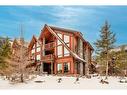 201-2100E Stewart Creek Drive, Canmore, AB  - Outdoor With Facade 