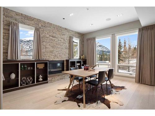 201-2100E Stewart Creek Drive, Canmore, AB - Indoor Photo Showing Dining Room