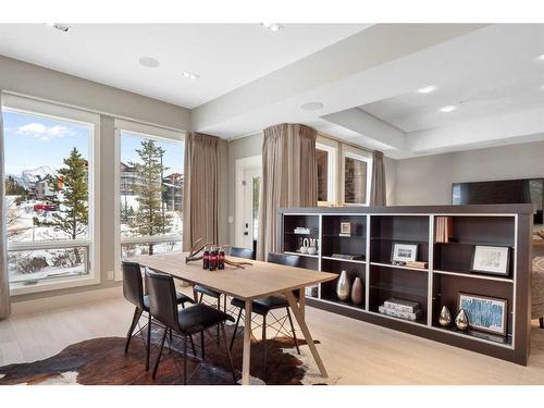 201-2100E Stewart Creek Drive, Canmore, AB - Indoor Photo Showing Dining Room