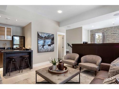 201-2100E Stewart Creek Drive, Canmore, AB - Indoor Photo Showing Living Room