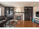 129 Millrise Square Sw, Calgary, AB  - Indoor Photo Showing Living Room With Fireplace 