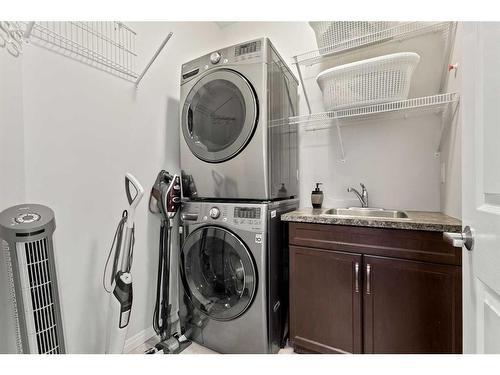 411 Windrow Common Sw, Airdrie, AB - Indoor Photo Showing Laundry Room