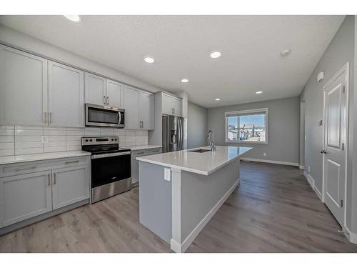 1870 Rangeview Drive Se, Calgary, AB - Indoor Photo Showing Kitchen With Upgraded Kitchen