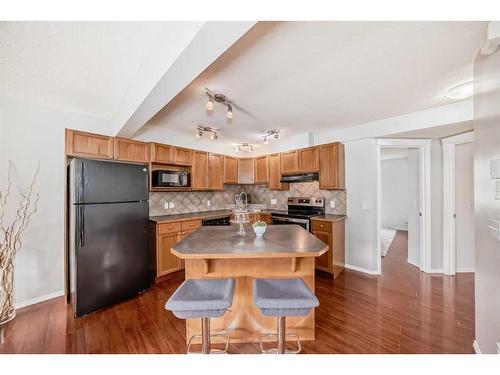 409-140 Sagewood Boulevard Sw, Airdrie, AB - Indoor Photo Showing Kitchen