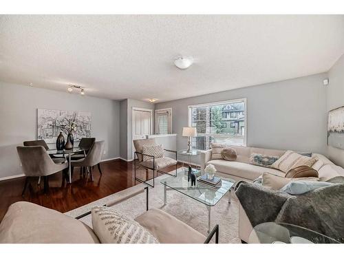 409-140 Sagewood Boulevard Sw, Airdrie, AB - Indoor Photo Showing Living Room