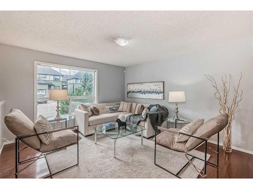 409-140 Sagewood Boulevard Sw, Airdrie, AB - Indoor Photo Showing Living Room