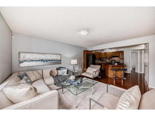 409-140 Sagewood Boulevard Sw, Airdrie, AB - Indoor Photo Showing Living Room