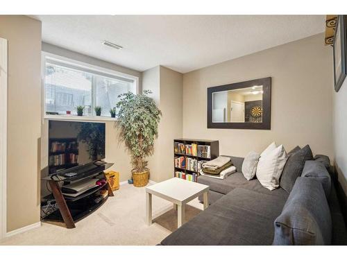 60 Erin Woods Court Se, Calgary, AB - Indoor Photo Showing Living Room