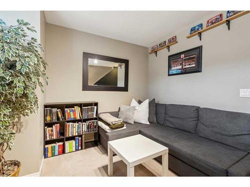 60 Erin Woods Court Se, Calgary, AB - Indoor Photo Showing Living Room