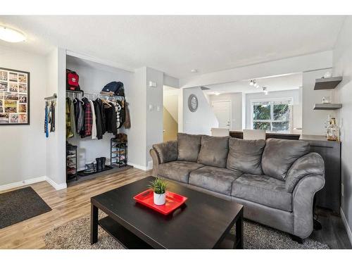 60 Erin Woods Court Se, Calgary, AB - Indoor Photo Showing Living Room