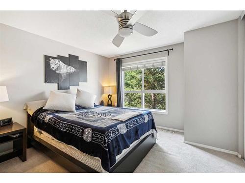 60 Erin Woods Court Se, Calgary, AB - Indoor Photo Showing Bedroom