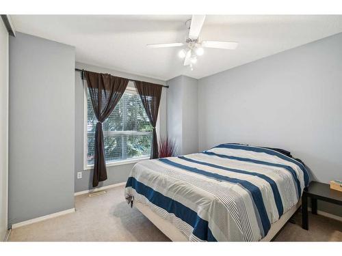 60 Erin Woods Court Se, Calgary, AB - Indoor Photo Showing Bedroom