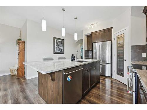 2132 Ravensdun Crescent Se, Airdrie, AB - Indoor Photo Showing Kitchen With Stainless Steel Kitchen With Upgraded Kitchen