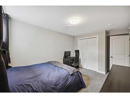 2132 Ravensdun Crescent Se, Airdrie, AB - Indoor Photo Showing Bedroom