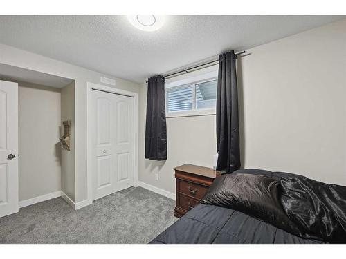 2132 Ravensdun Crescent Se, Airdrie, AB - Indoor Photo Showing Bedroom