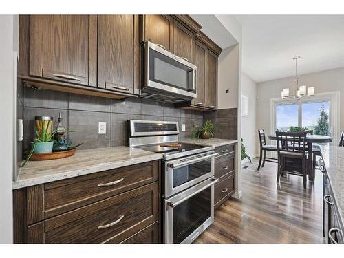 2132 Ravensdun Crescent Se, Airdrie, AB - Indoor Photo Showing Kitchen