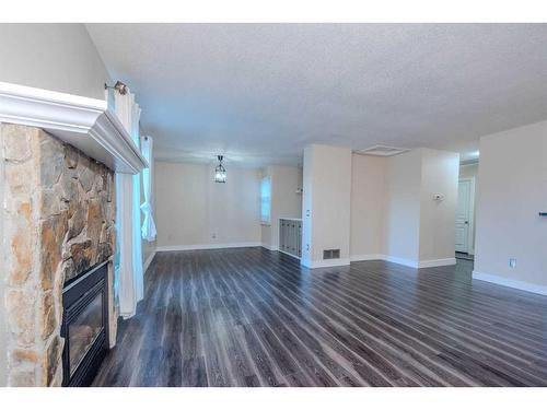 217-36 Glamis Green Sw, Calgary, AB - Indoor With Fireplace