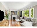 1925 12 Avenue Sw, Calgary, AB  - Indoor Photo Showing Living Room With Fireplace 