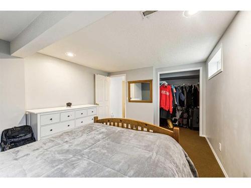 1436 Lake Ontario Drive Se, Calgary, AB - Indoor Photo Showing Bedroom