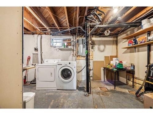 1436 Lake Ontario Drive Se, Calgary, AB - Indoor Photo Showing Laundry Room