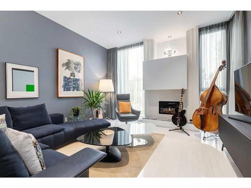 2036 31 Avenue Sw, Calgary, AB - Indoor Photo Showing Living Room With Fireplace