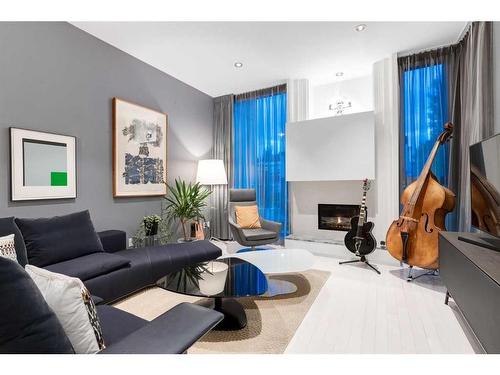 2036 31 Avenue Sw, Calgary, AB - Indoor Photo Showing Living Room With Fireplace